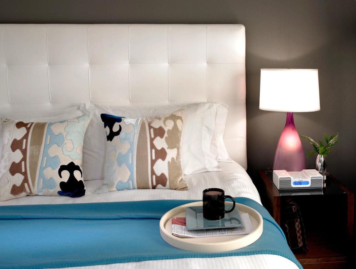 Hotel Murano Tacoma Pokoj fotografie A bedroom at the Hotel Indigo in San Francisco